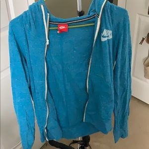 Women’s bright blue Nike full length zip up
